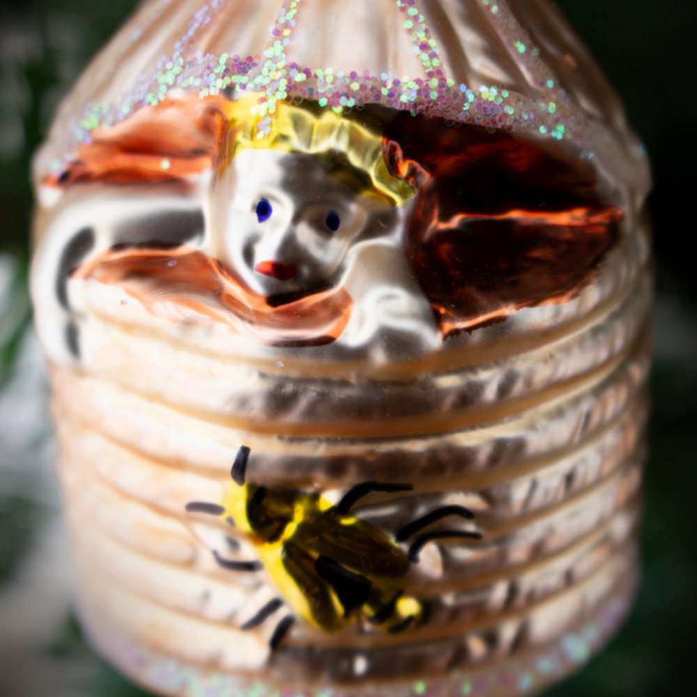 Baby in a Beehive, Old World Christmas glass ornament.